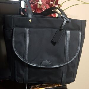Kate Spade Black Tote with Durable Fabric and Curved Flap